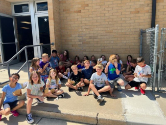 When it is this hot outside you do a science experiment and make s'mores using the sun!!